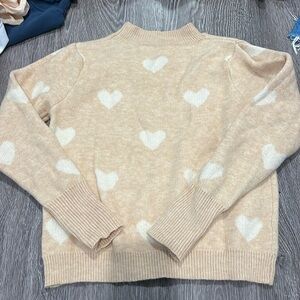 Cream heart sweater with puffed shoulders